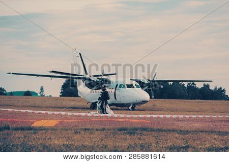 Parachutist Aircraft On Land