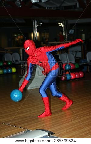 Kiev, Ukraine, 08.09.2008 A Man In A Costume Of Spiderman Is Throwing A Ball Indoors Of The Club Bow
