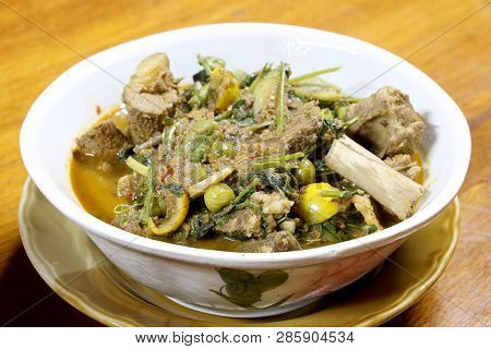Northern Thai Spicy Curry With Pork And Mixed Vegetables And Thai Herbs With A Northern Spices In Wh