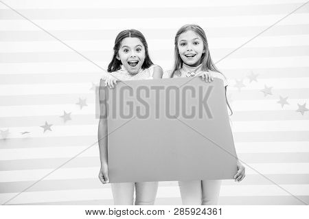 Amazing Surprising News. Girl Hold Announcement Banner. Girls Kids Holding Paper Banner For Announce
