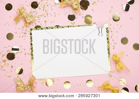 Blank Sheet Of Paper, Notebook On A Festive Pink Background With Golden Confetti And Glitter. Univer