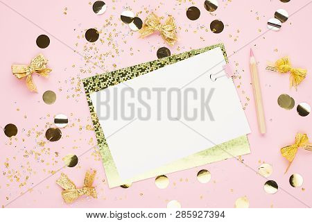 Blank Sheet Of Paper, Notebook On A Festive Pink Background With Golden Confetti And Glitter. Univer