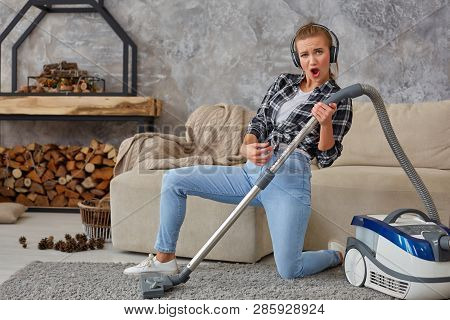 Full Length Portrait Of Cheerful Young Woman 20s Listening To Music Via Headphones And Having Fun Wi