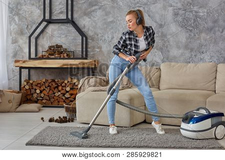 Full Length Portrait Of Cheerful Young Woman 20s Listening To Music Via Headphones And Having Fun Wi