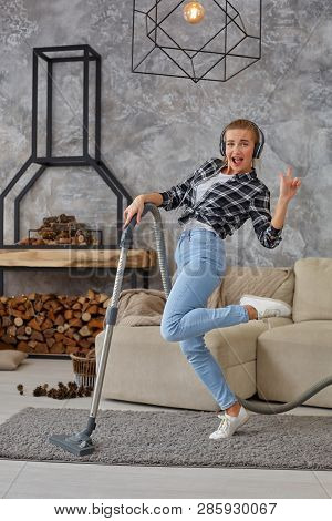 Full Length Portrait Of Cheerful Young Woman 20s Listening To Music Via Headphones And Having Fun Wi