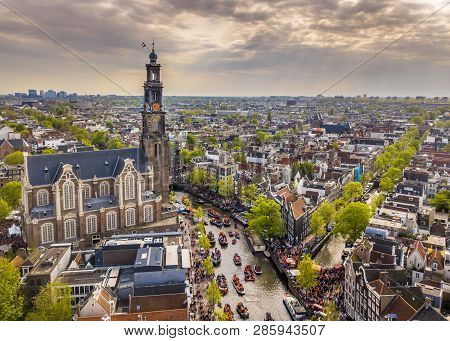 Amsterdam Aerial View Of Westerkerk Church Seen From North On Koningsdag Kings Day Festivities. Birt