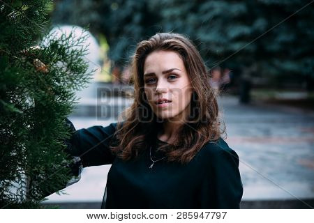 Beautiful Young Girl In The Park On A Summer Evening.
