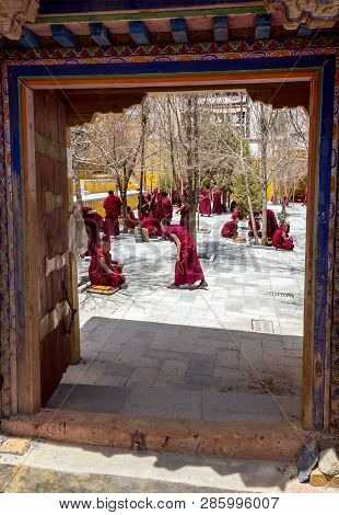 Lhasa, Tibet - April 23, 2012: View Through The Entrance Door Of Tibetan Monks At Sera Monastery Deb