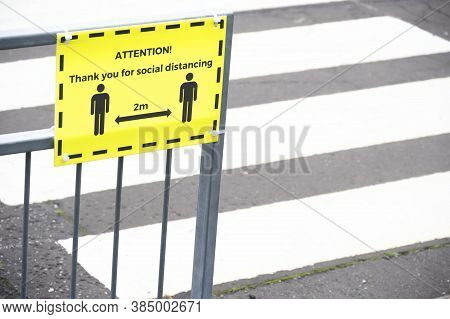 Social Distancing Sign At School Playground Road Crossing