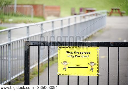Social Distancing Sign At School Playground Road Crossing