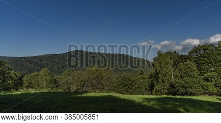 Big Mountains In Poland Near Cisna Town In Blue Sky Summer Day