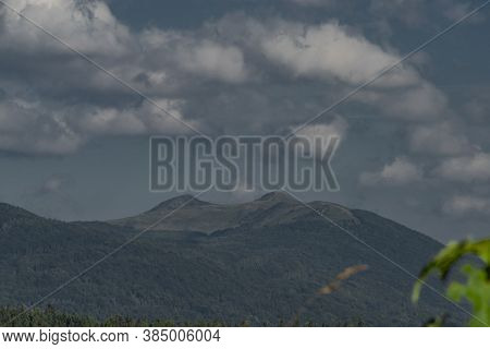 Big Mountains In Poland Near Cisna Town In Blue Sky Summer Day