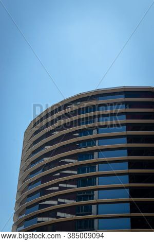 Bandung, West Java/ Indonesia - 25th August 2020: Reflective Blue Glass Facade And Its Repetitive Su