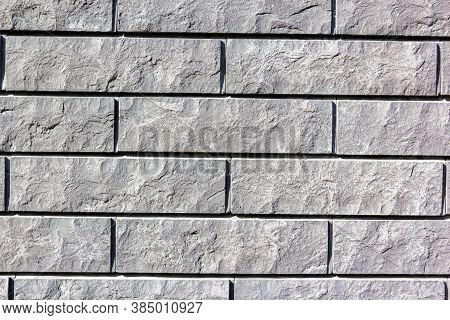 Grey Wall Tiles Imitating Brickwork. Modern Finishing Material. Gray Facade Facing Tiles, Imitating 