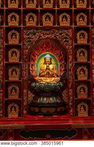 Singapore - 11 2018: Spiritual Atmosphere In Buddha Tooth Temple