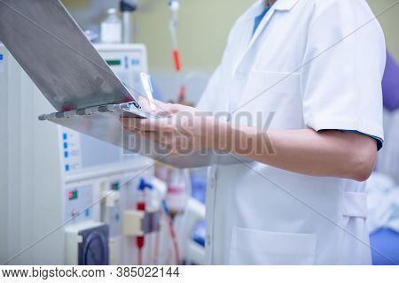 The Specialist Are Doing Continuous Renal Replacement Therapy Equipment And Injection Pump.