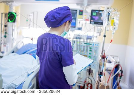 The Specialist Are Checking Continuous Renal Replacement Therapy Equipment And Injection Pump And He