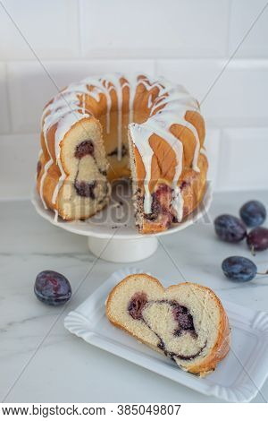 German Gugelhupf Cake Filled With Poppy Seeds And Plums