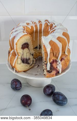 German Gugelhupf Cake Filled With Poppy Seeds And Plums