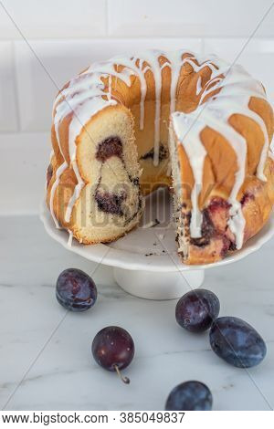 German Gugelhupf Cake Filled With Poppy Seeds And Plums