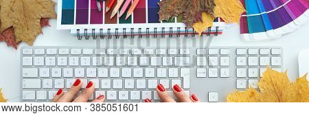 Female Hand Type Text Message With White Keyboar On Office Table Closeup. Autumn Professional Busine