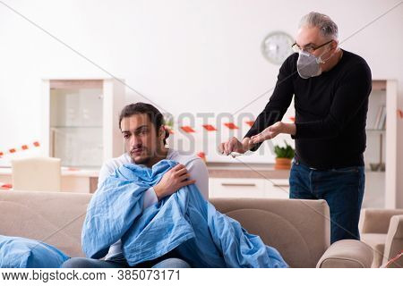 Father and son in coronavirus disease concept at home