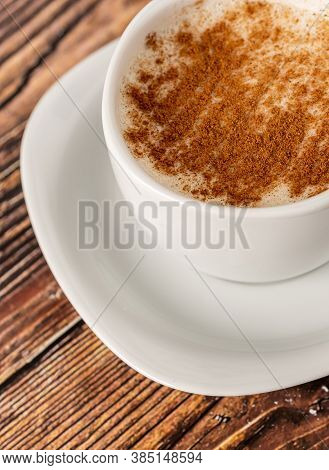 Turkish Salep Or Sahlep With Cinnamon On Wooden Table