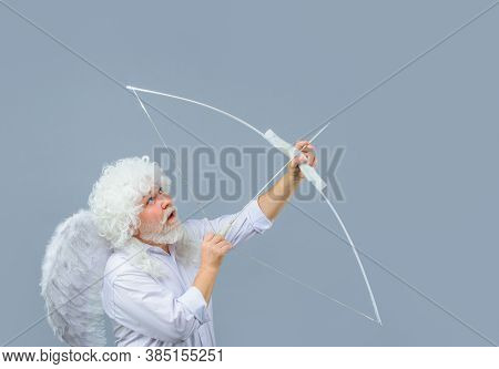 Arrow Of Love. Valentines Day. Cupid Throws Arrow With Bow. Old Angel With Bow And Arrow. Cupid Ange