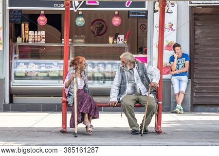 Pancevo, Serbia - June 13, 2015: Two Old Persons, A Senior Man And A Woman, Belonging To The Roma Co