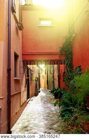 Old street in San Giovanni in Marignano town on sunny day, Rimini Province, Italy. Italian cityscape