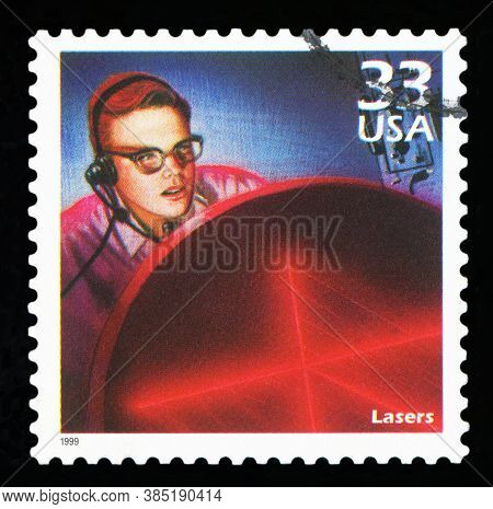 United States Of America - Circa 1999: A Postage Stamp Printed In Usa Showing An Image Of A Man Watc