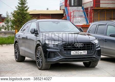 Novyy Urengoy, Russia - July 15, 2020: Black Luxury Crossover Audi Q8 In The City Street.