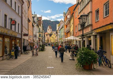 Fussen, Germany - October 29, 2016: Unidentified Tourists Walk Along Reichenstrasse - Central Street