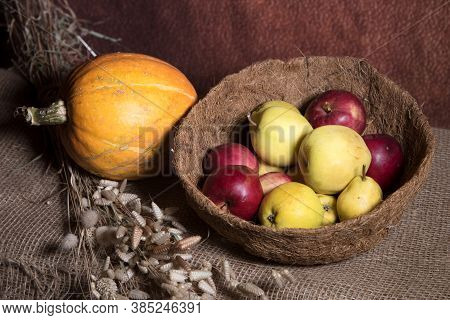 Still-life Painting With Basket Of Apples And Pumpkin. Thanksgiving Day