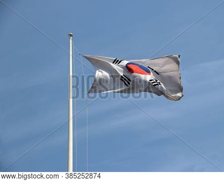 The Flag Of The Republic Of Korea, A White Background, A Red And Blue Taeguk, Symbolizing Balance, I