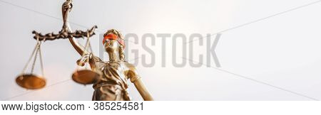 The Statue Of Justice - Lady Justice Or Iustitia / Justitia The Roman Goddess Of Justice With Red Bl