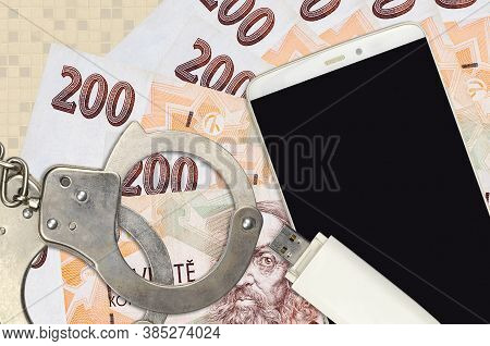 200 Czech Korun Bills And Smartphone With Police Handcuffs. Concept Of Hackers Phishing Attacks, Ill