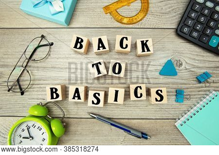 The Inscription On The Cubes Back To Basics. Back To Basics Text On A Table