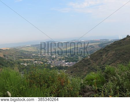 View Of A Village From Montes De Leon, Spain, On Camino De Santiago Pilgrimage Route
