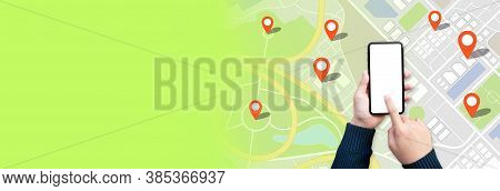 Navigation And Digital Map Concepts With Young Person Using Gps On Smartphone And City Town Backgrou