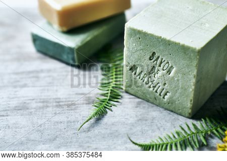 Rustic bar of natural Marseille Soap. Natural body care. Copy space