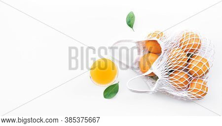 Fresh Orange From Garden In Crochet Bag.healthy And Nature Concepts.top View