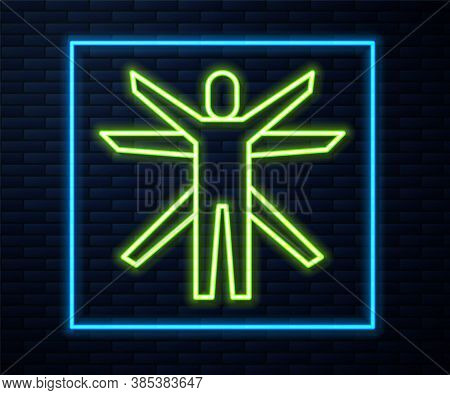 Glowing Neon Line Vitruvian Man By Leonardo Da Vinci Icon Isolated On Brick Wall Background. Human A