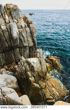 Rocky Seashore, Rough Stones On The Seashore, Coast Primorye Territory Telyakovsky Bay Of The Pacifi