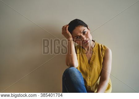 Low-spirited Female Staring In Front Of Her