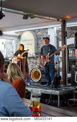 Cape Town, South Africa, 9.6.2014, night life at a tavern by the waterfront Ferrymans