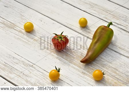 Red Tomato Four Yellow Small Tomatoes Bell Pepper Pod