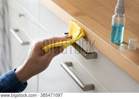 Prevention Concepts On Coronavirus ( Covid-19 ) Outbreak Situation With Person Cleaning Kitchen Furn