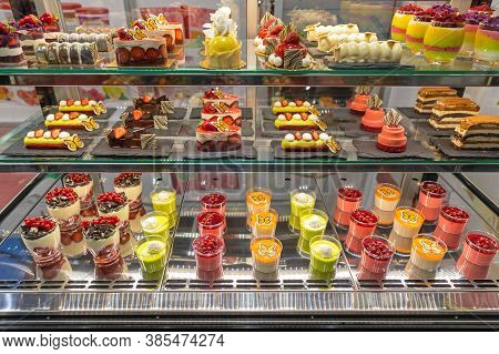 Assortment Of Pastries And Cakes In Patisserie Display