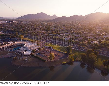 Early evening image of Scottsdale, Arizona,USA with view of camelback Mountain on horizon.